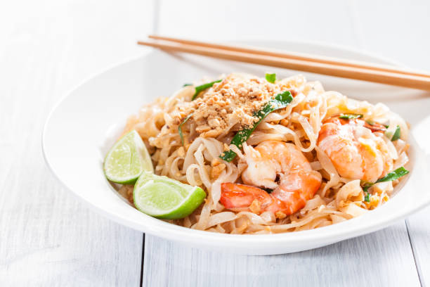 istock Pad Thai Stir Fried Asian Noodles With Shrimp, Egg, Tofu And Bean Sprouts 682207752