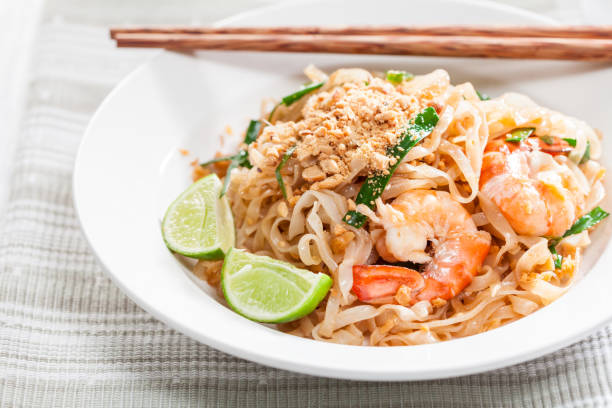 istock Pad Thai Stir Fried Asian Noodles With Shrimp, Egg, Tofu And Bean Sprouts 682207760