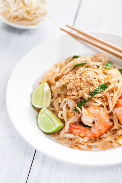 istock Pad Thai Stir Fried Asian Noodles With Shrimp, Egg, Tofu And Bean Sprouts 682207768