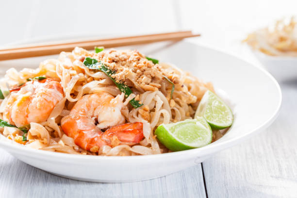 istock Pad Thai Stir Fried Asian Noodles With Shrimp, Egg, Tofu And Bean Sprouts 682207770