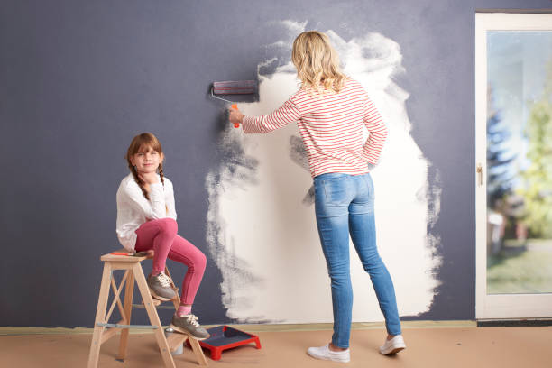 istock Painting wall in new home 682208458