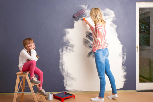 istock Painting wall in new home 682208476