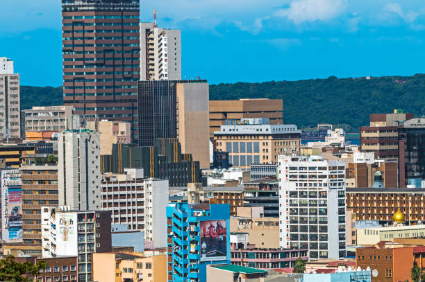 istock Beachfront Promenade against Durban City Skyline Blue Sky 682212476