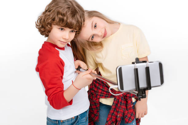 istock Kids taking selfie with smartphone 682216988