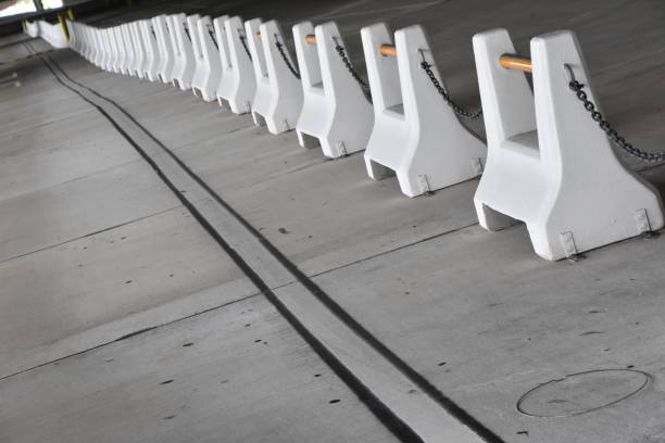 istock Concrete barriers in a parking lot 682219692