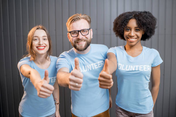 istock Happy volunteers indoors 682221952