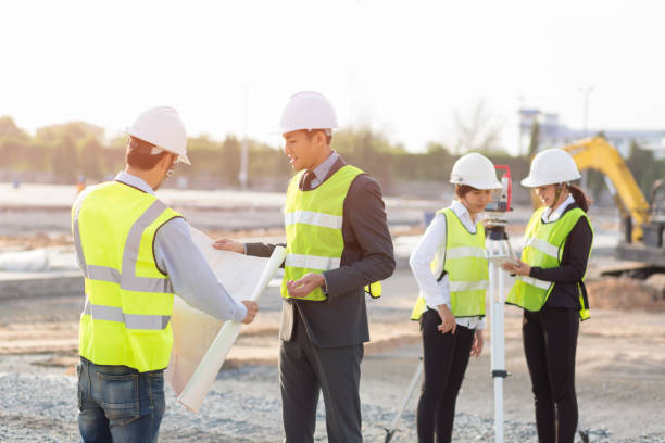 istock Asian construction engineer,Asian secretary and Asian foreman worker checking construction site for new Infrastructure construction project 682222026
