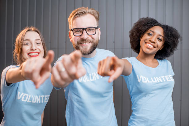 istock Happy volunteers indoors 682222056