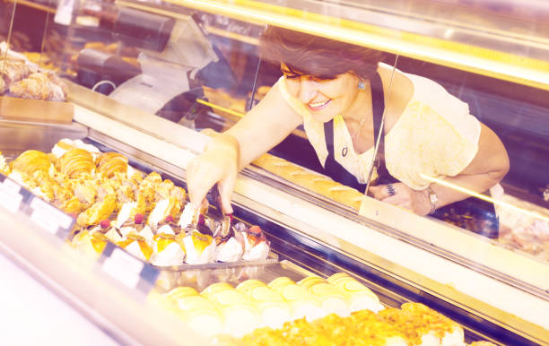 istock woman with confectionery products 682222684