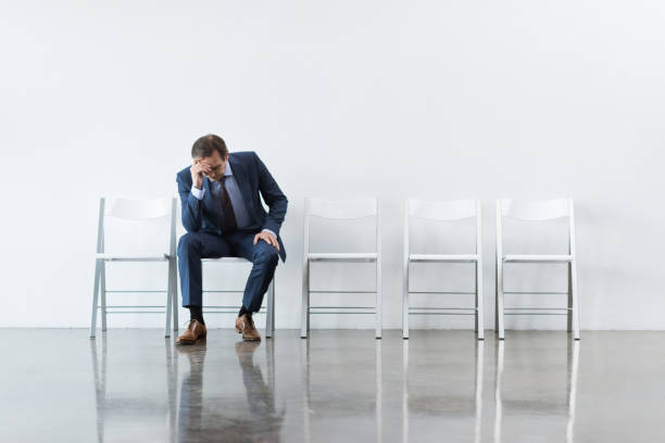 istock businessman sitting on chair 682224320