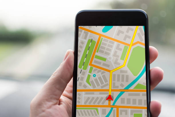 istock GPS Navigation on Mobile Phone Device and Transportation Concept. Male Hand Using Navigation System Map Tracking on Smartphone with Copy Space. 682226616