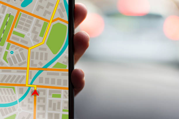 istock GPS Navigation on Mobile Phone Device and Transportation Concept. Male Hand Using Navigation System Map Tracking on Smartphone with Copy Space. 682229032