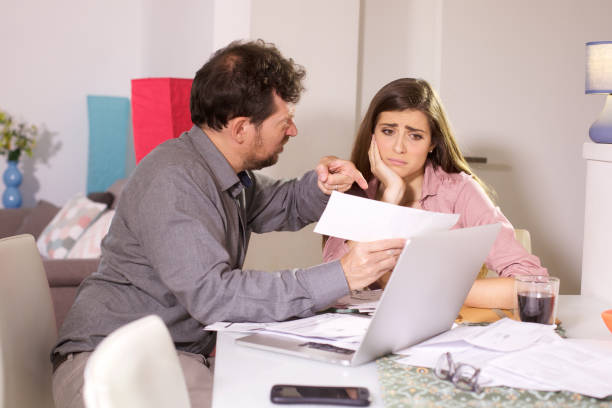 istock Husband angry with wife showing high bill 682229314