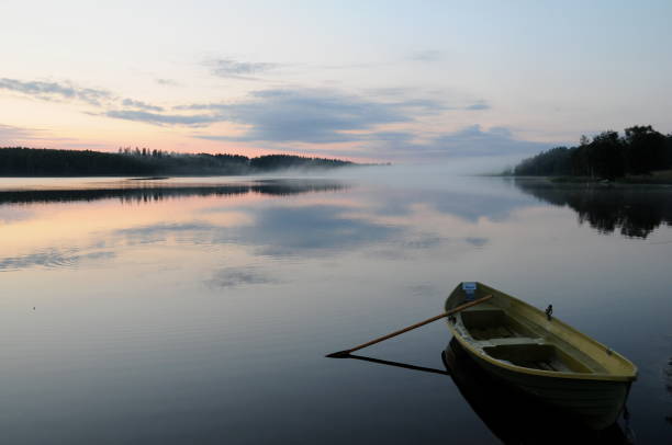 istock Boat on Swedish lake a summer evening 682230818