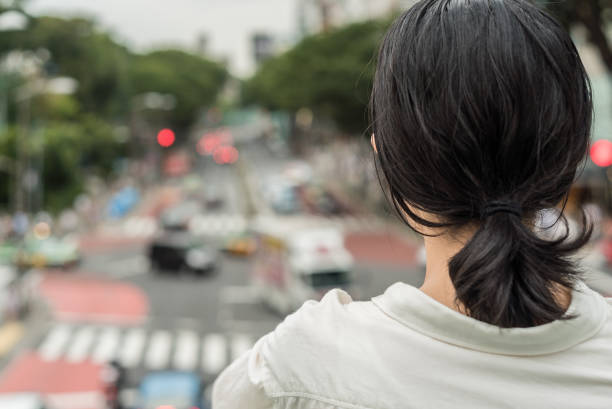 istock Woman looking at the city 682235948