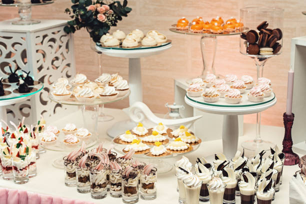 istock modern stylish luxury wedding candy bar. a wide range of sweets on a wedding cande bar. 682236068