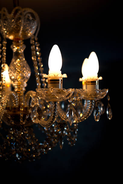 istock Ceiling lamp in crystal with lighted lamps 682236756
