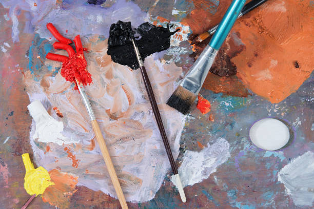 istock Paint brush on wood used palette 682239520