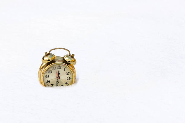 istock gold watch on a pure white snow 682239656