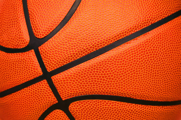 nahaufnahme von leder basketball hintergrund strukturiert - gummi fotos stock-fotos und bilder
