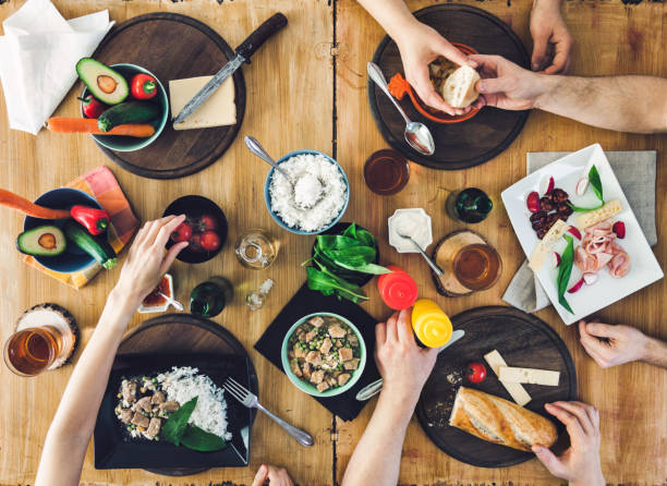 istock Top view, Group of people sitting at the table having meal 682244698