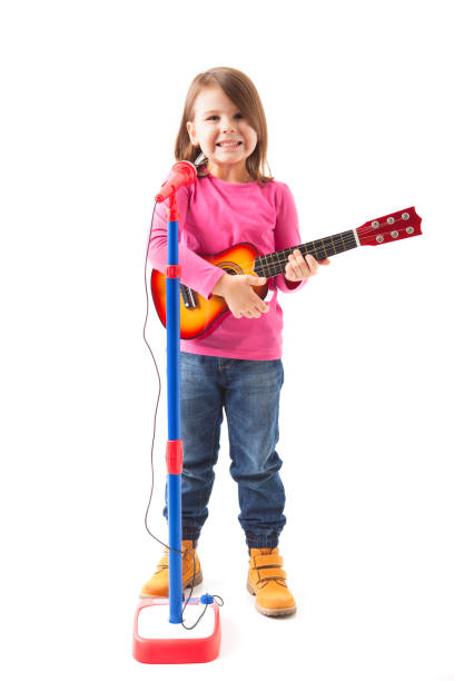 istock Happy little girl singing 682248006