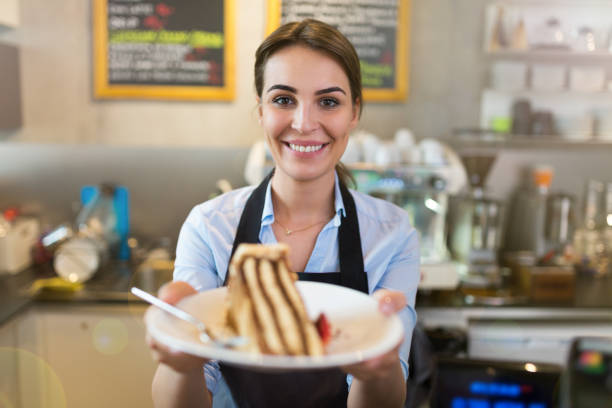 istock Woman working in coffee shop 682257572