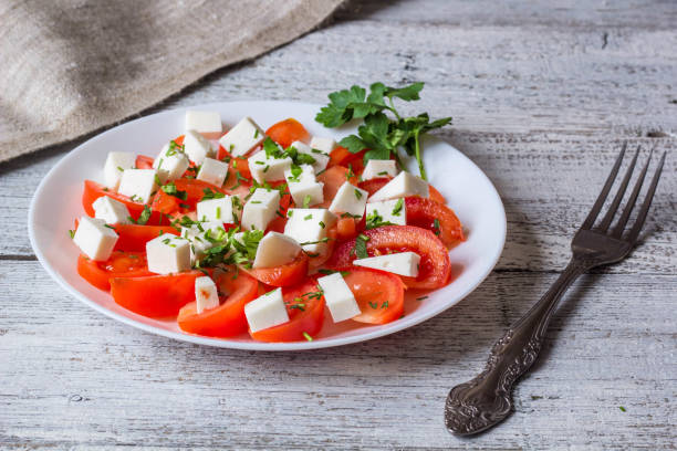 istock Fresh salad with tomato, mozzarella and herbs. 682257768