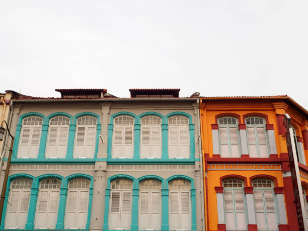 istock Green and orange buildings 682257872