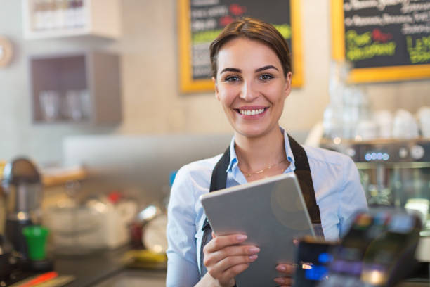istock Woman working in coffee shop 682258068