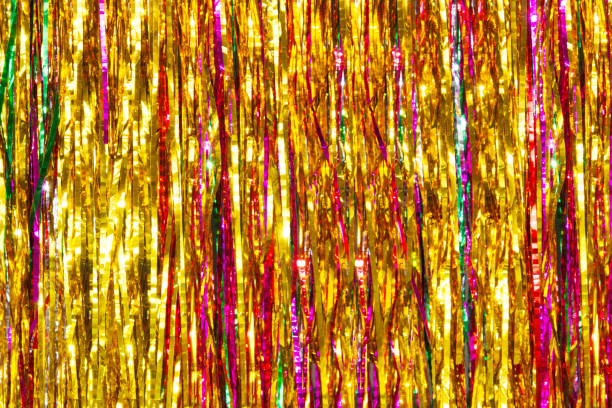 istock Colorful tinsel. Christmas blurred background 682258388
