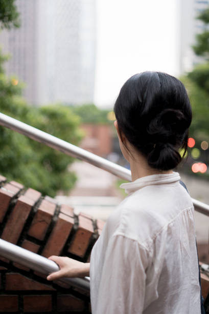 istock Woman looking at the city 682258458