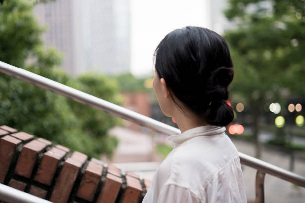 istock Woman looking at the city 682258476