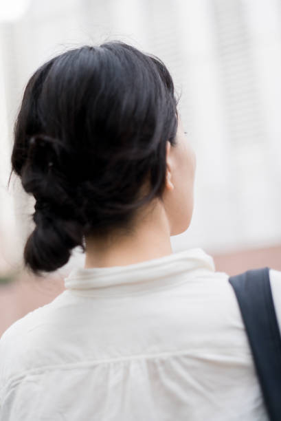 istock Woman looking at office buildings 682258638