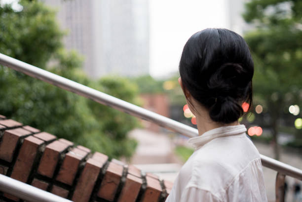 istock Woman looking at the city 682260330