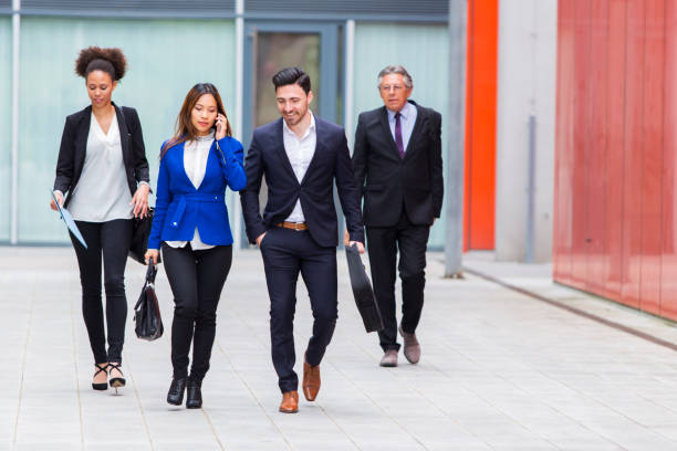 istock Business people walking on a street 682260778
