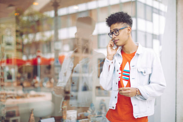 istock Young man using phone in the city 682261322