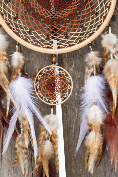 istock Dreamcatcher made of feathers, leather, beads, and ropes 682264550