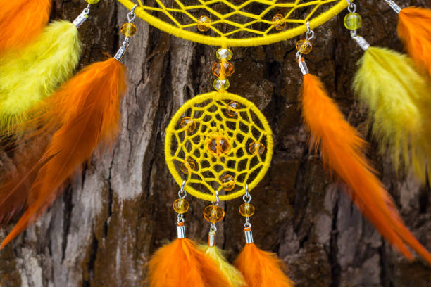 istock Dreamcatcher made of feathers, leather, beads, and ropes 682264744