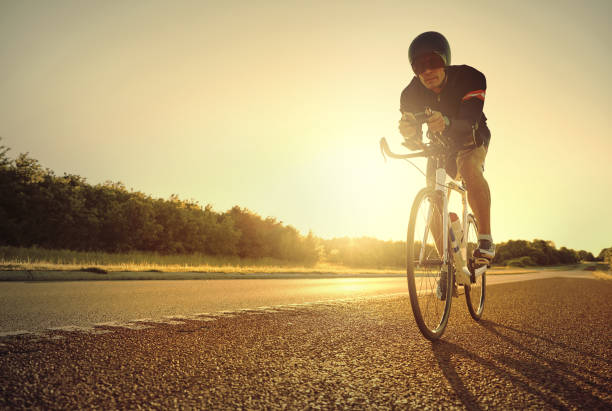 istock Man racing road at sunrise 682268482