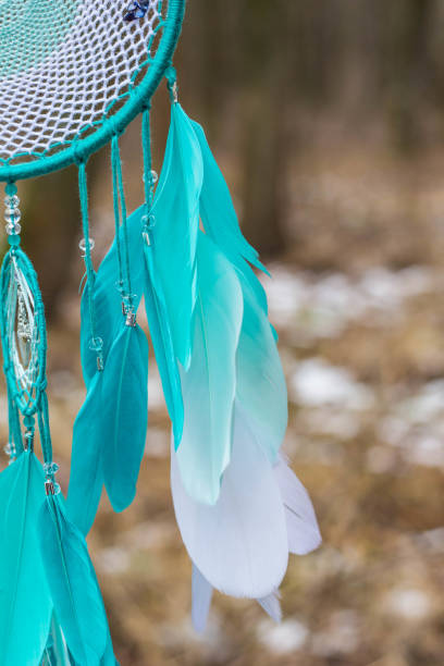 istock Dreamcatcher made of feathers, leather, beads, and ropes 682269038