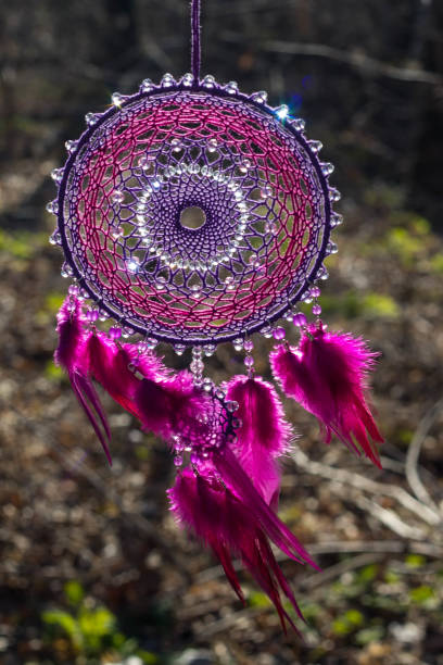 istock Dreamcatcher made of feathers, leather, beads, and ropes 682269094