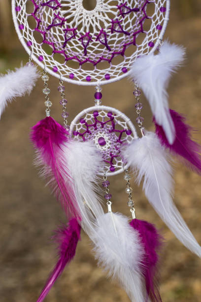istock Dreamcatcher made of feathers, leather, beads, and ropes 682269208
