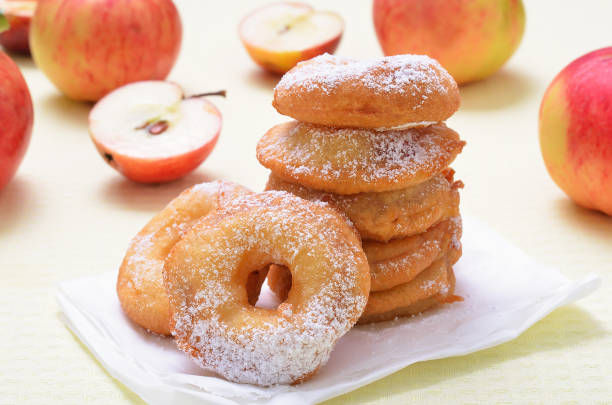 istock Homemade donuts with apples and powdered sugar 682274154