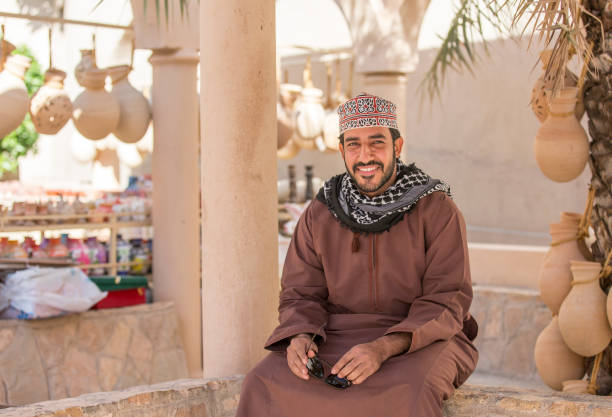 Omani man in traditional clothing stock photo