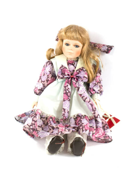 istock Girl Toy Doll on Black Background 682279052