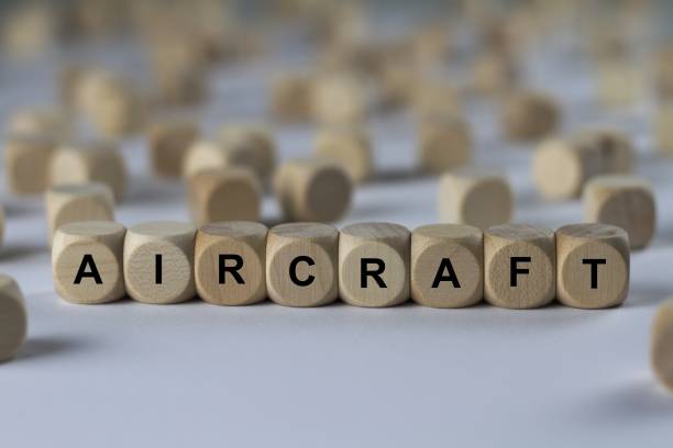 istock aircraft - cube with letters, sign with wooden cubes 682279388