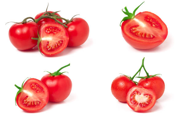istock tomato and half with water droplets isolated on white background. Set or collection 682282940