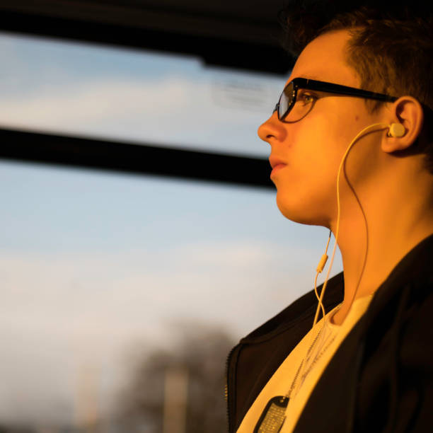 istock teenage boy on the tram 682286040