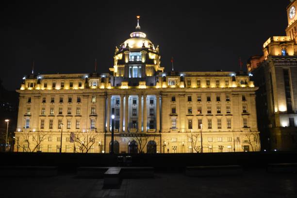 istock HSBC Building by night on the Bund, Shanghai, China 682289026